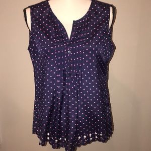 Sleeveless silky shirt with bottom cut out detail